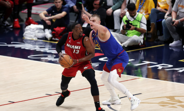 约基奇绝杀时刻，冲击季后赛点燃赛场，热火迎来胜利！